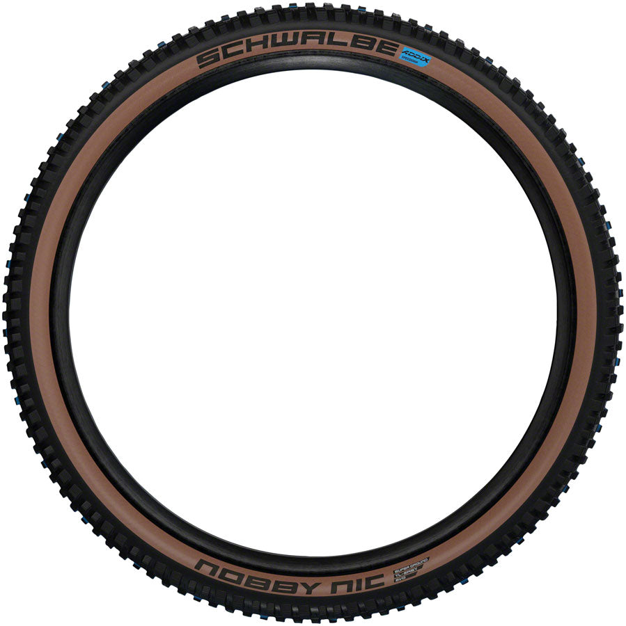 Schwalbe Nobby Nic Tire - 27.5 x 2.35 Tubeless Folding BLK/Bronze Evolution Line Super Ground Addix SpeedGrip - Schwalbe Tires