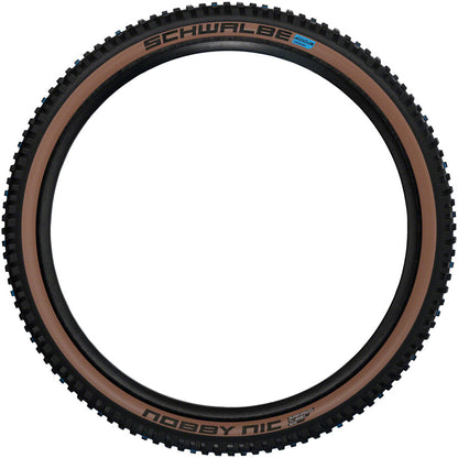 Schwalbe Nobby Nic Tire - 27.5 x 2.35 Tubeless Folding BLK/Bronze Evolution Line Super Ground Addix SpeedGrip - Schwalbe Tires